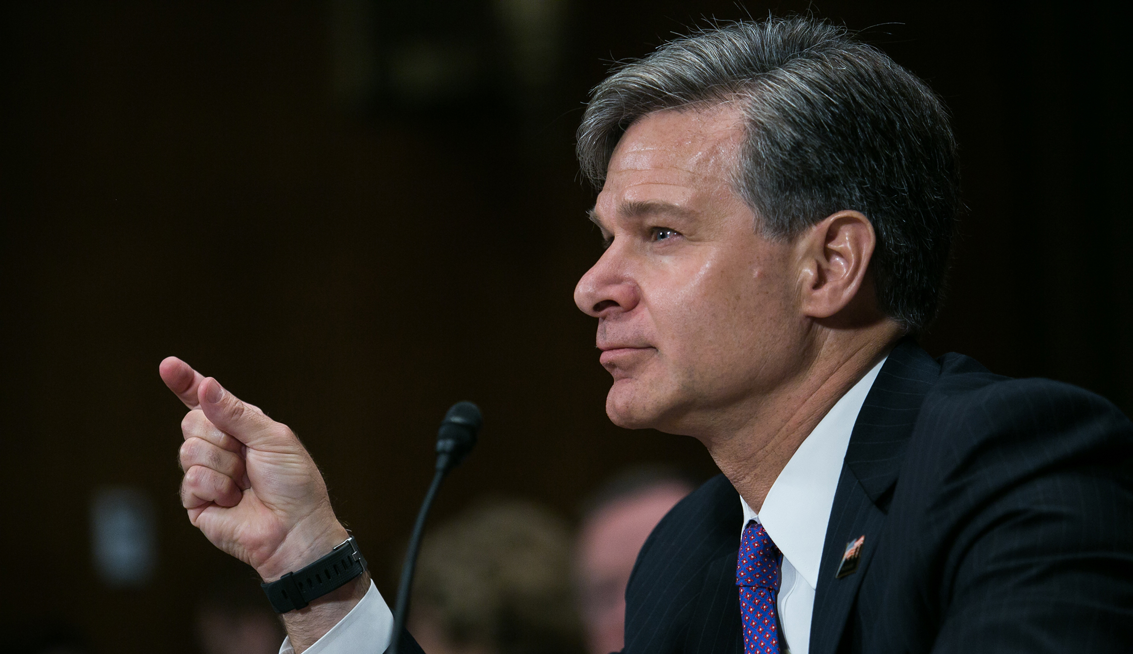 FBI nominee: Call the FBI if someone threatens to influence an election