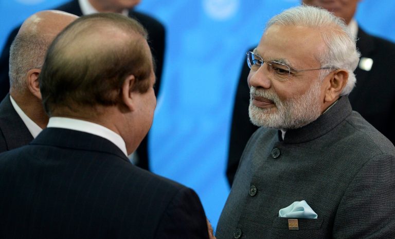 When Narendra Modi arrived at an airport in Lahore during his short layover, Pakistani Prime Minister Nawaz Sharif greeted him. (AP Photo)