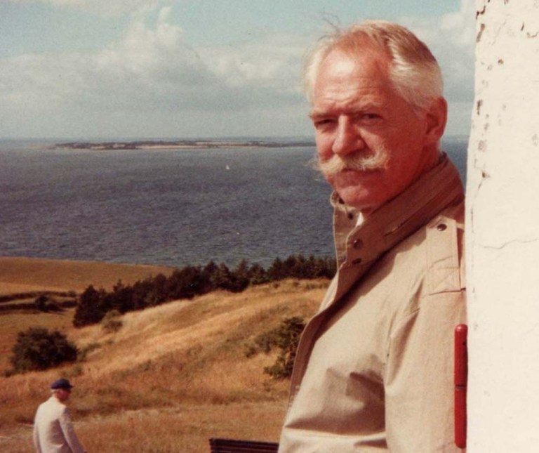 In this undated photo provided by Peter Blegvad, Erik Blegvad poses on the Danish island of Samso.  Children's book artist Erik Blegvad, known for his whimsical illustrations of more than 100 books, has died in London. He was 90. His eldest son, musician and cartoonist Peter Blegvad, said his father died on Jan. 14, 2014. The wide-ranging artist was a native of Denmark who studied at the Copenhagen School of Arts and Crafts before developing his reputation in the New York and Paris publishing worlds.  Among his best known works are the illustrations for 