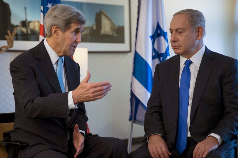 U.S. Secretary of State John Kerry, left, speaks with Israeli Prime Minister Benjamin Netanyahu during a meeting in Berlin, Germany Thursday, Oct. 22, 2015. (Carlo Allegri/Pool Photo via AP)