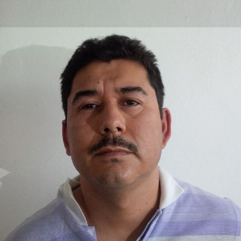 FILE - In this file image released by the Mexico Attorney General's Office on Saturday, Feb. 22, 2014, Carlos Manuel Hoo Ramirez is photographed against a wall right after he was arrested along with Joaquin 