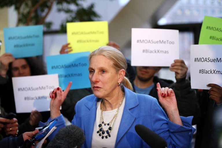 In this Dec. 21, 2015 photo, Mall of America attorney Susan Gaertner speaks to the media surrounded by Black Lives Matter members after a hearing at the Hennepin County Government Center in Minneapolis. (Jerry Holt/Star Tribune/St. Paul Pioneer Press/AP)