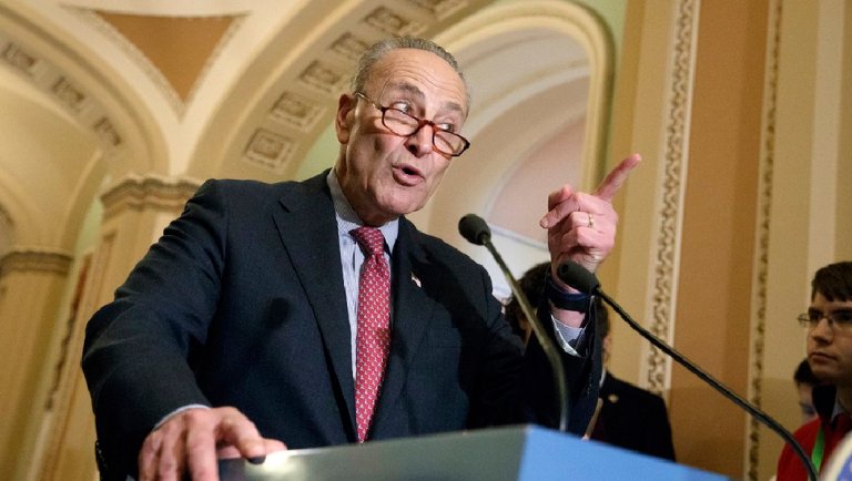 Sen. Chuck Schumer, D-N.Y., was in the middle of a speech critical of the GOP tax bill Tuesday night when he stopped to reprimand Republicans who were talking. (AP Photo/J. Scott Applewhite)