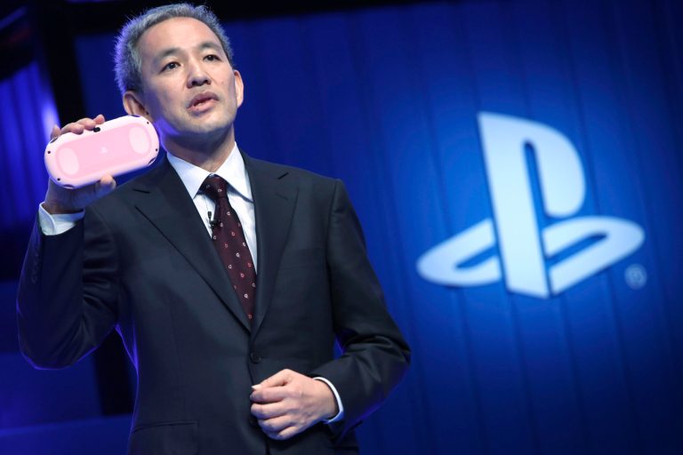 Sony Computer Entertainment Japan and Asia (SCEJA) president Atsushi Morita reveals a âLight Pink/Whiteâ model of the PlayStation Vita during SCEJA press conference in Tokyo, Monday, Sept. 1, 2014. (AP Photo/Eugene Hoshiko)