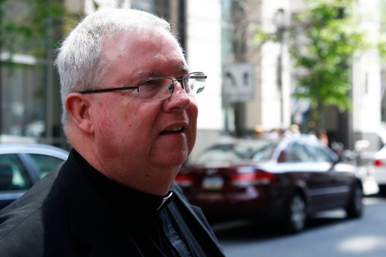   Monsignor William Lynn walks from the Criminal Justice Center, Thursday, June 14, 2012, in Philadelphia. Lynn is the first Roman Catholic church official in the U.S. ever charged with child endangerment, for allegedly keeping co-defendants former priest Edward V. Avery and the Rev. James J. Brennan, and other accused predators, in ministry. (AP Photo/Matt Rourke)  