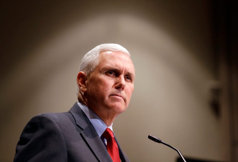 FILE - In this Tuesday, Jan. 27, 2015 file photo, Indiana Gov. Mike Pence announces that the Centers for Medicaid and Medicare Services has approved the state's waiver request for the plan his administration calls HIP 2.0, during a speech in Indianapolis. Pence said Wednesday that he regrets the 