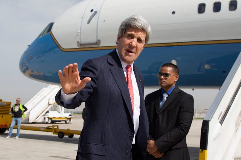 Secretary of State John Kerry on Tuesday says goodbye as he leaves Tel Aviv, Israel, continuing on to NATO meetings in Brussels after meeting with Israeli Prime Minister Benjamin Netanyahu. (AP Photo/Jacquelyn Martin, Pool)