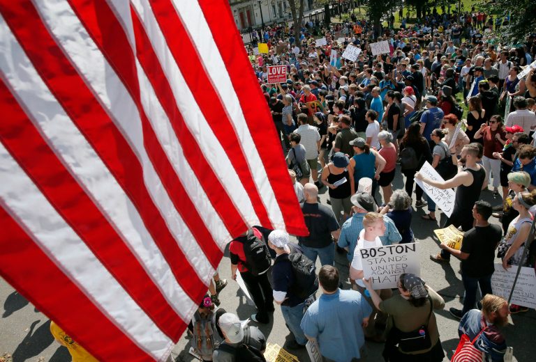 Thousands gathered in Boston, Mass., on Saturday in competing demonstrations just one week after a violent rally in Charlottesville, Va. led to the death of one demonstrator. (AP Photo/Michael Dwyer)