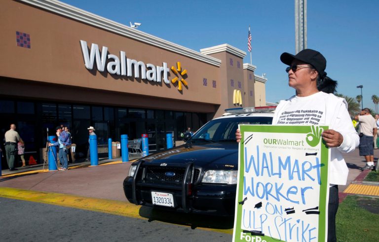 Angelita Rodriguez protests outside a Walmart store in Paramount, Calif., on Nov. 23, 2012. ( AP Photo/Nick Ut)