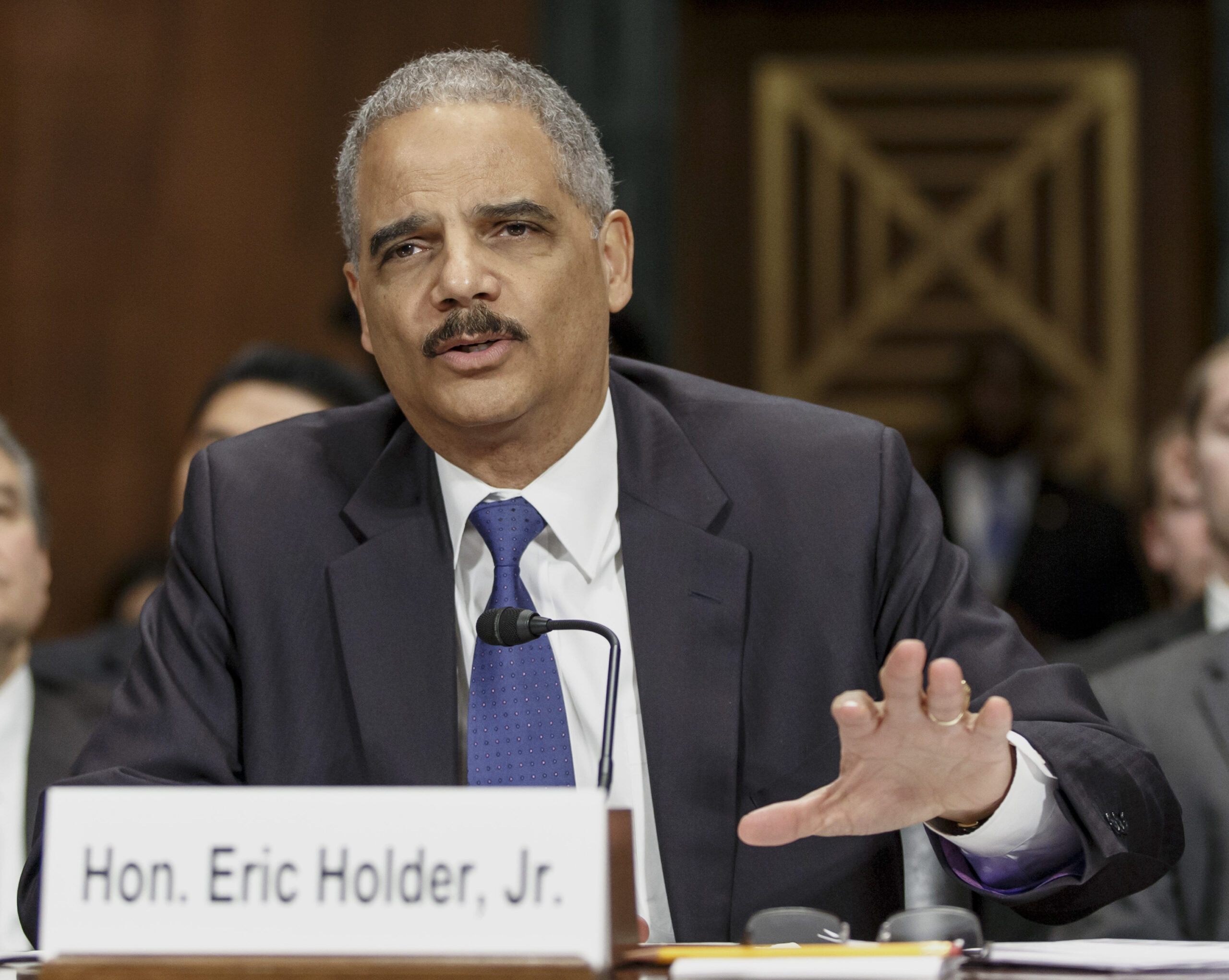 AG urges restoring voting rights to ex-inmates