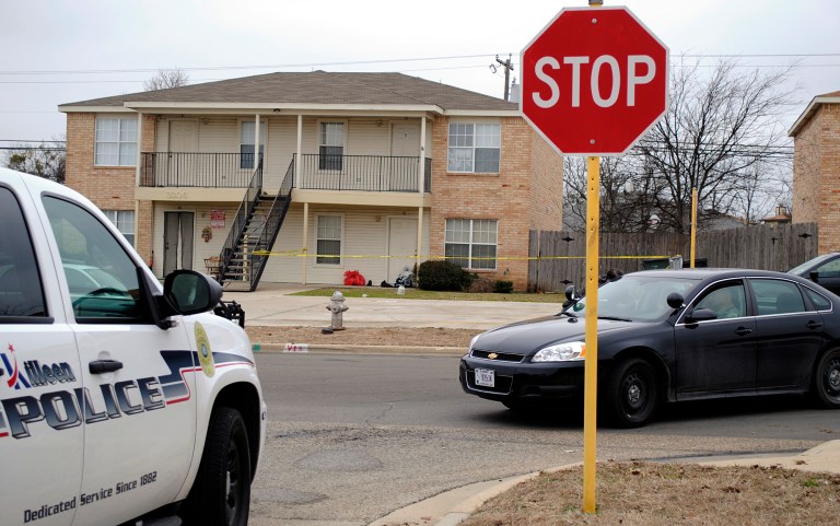 Killeen police investigate the death of a Fort Hood soldier who was found dead at his Killeen, Texas, home on Tuesday, Jan. 13, 2015. The first of two Ebola tests given as a precaution came back negative. He had returned from deployment in West Africa. (AP Photo/The Killeen Daily Herald, Eric J. Shelton)