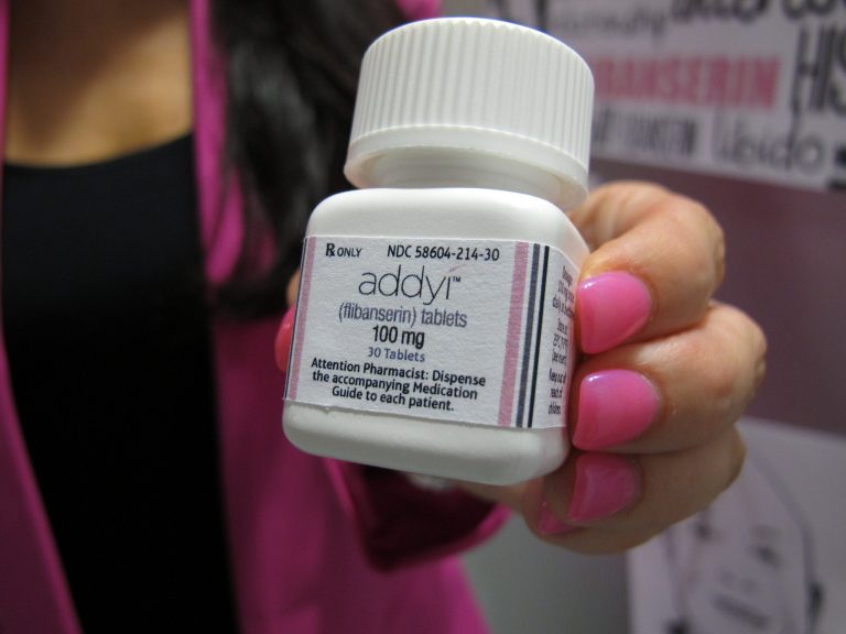 Sprout Pharmaceuticals CEO Cindy Whitehead holds a bottle for the female sex-drive drug Addyi. After two rejections, the U.S. Food and Drug Administration gave approval Tuesday for the drug as a treatment for hypoactive sexual desire disorder, a first for women. (AP Photo/Allen G. Breed)