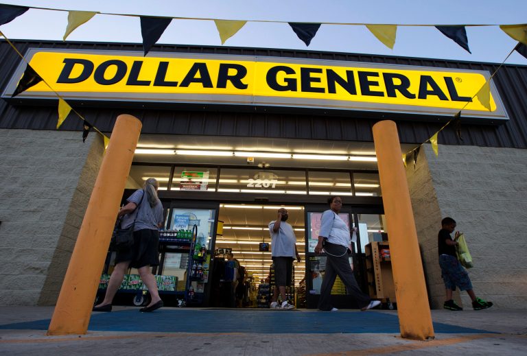 FILE -In this Wednesday, Sept. 25,  file 2013, photo, customers exit a Dollar General store, in San Antonio. The Federal Reserve reports how much consumers borrowed in September on Thursday, Nov. 7, 2013. (AP Photo/Eric Gay, File)