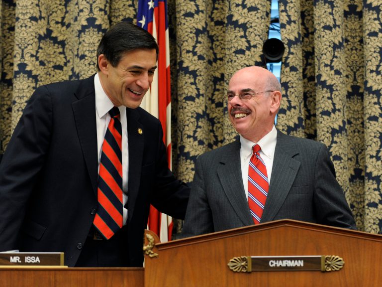 Then-House Oversight and Government Reform Committee Chairman Rep. Henry Waxman, D-Calif., right, shares a laugh with Rep. Darrell Issa, R-Calif., on Capitol Hill in Washington in December 2008. (AP Photo/Susan Walsh)
