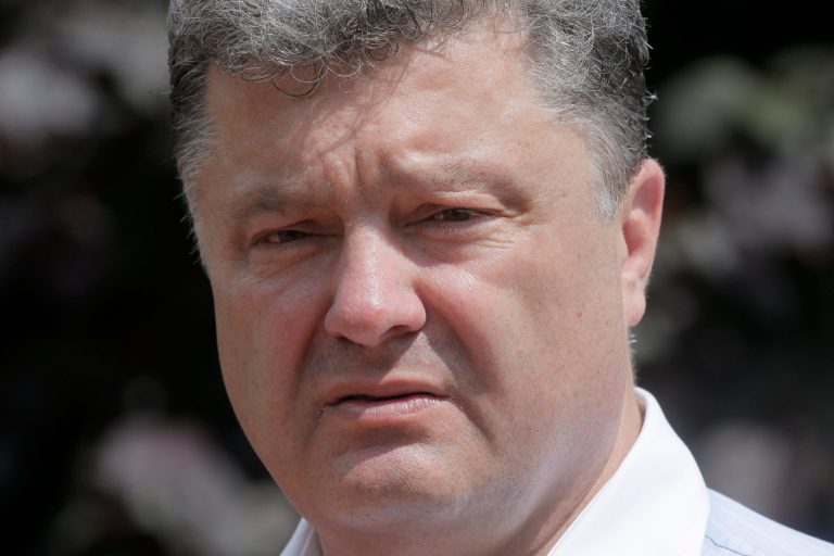 Ukrainian presidential candidate Petro Poroshenko pauses,  during a rally  in Uman, Ukraine, Tuesday, May 20, 2014. Presidential vote in Ukraine is scheduled for May 25. Ukraine is holding a presidential election Sunday but it has become downright dangerous for many in the east to be associated with the vote, since the eastern regions of Donetsk and Luhansk declared independence last week. Ukrainian police and election officials accuse pro-Russia gunmen there of seizing election commission offices and threatening members in an effort to derail the presidential vote. (AP Photo/Efrem Lukatsky)