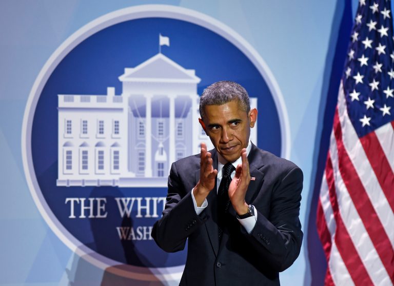 President Barack Obama applauds as he leaves the stage after speaking at the Summit on College Opportunity at the Ronald Reagan Building in Washington, Thursday, Dec. 4, 2014. (AP Photo/Susan Walsh)