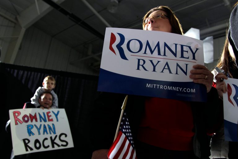 Supporters of Republican vice presidential candidate, Rep. Paul Ryan, R-Wis., hold signs during a campaign event, Sunday, Nov. 4, 2012 in Mansfield, Ohio.  (AP Photo/Mary Altaffer)