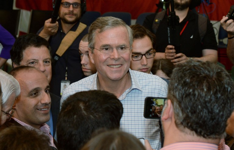 DERRY, NH - JUNE 16: Republican presidential candidate and former Florida Gov. Jeb Bush poses for pictures after a town hall event at Adams Memorial Opera House June 16, 2015 in Derry, New Hampshire. Bush announced his candidacy for president on June 15. (Photo by Darren McCollester/Getty Images)
