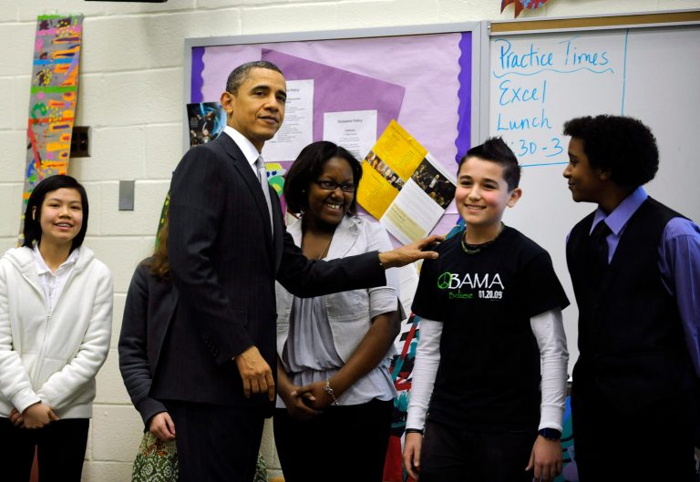 President Obama visits with students in a classroom while at Kenmore Middle School to deliver a speech on reforming education March 14, 2011 in Arlington, Virginia.(Photo by Leslie E. Kossoff - Pool/Getty Images)