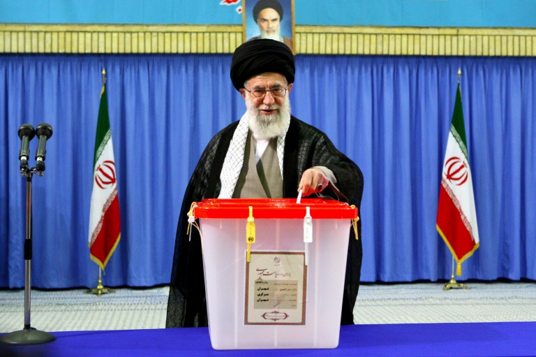 In this photo released by an official website of the Iranian supreme leader's office, Supreme Leader Ayatollah Ali Khamenei casts his ballot in the presidential election without publicly endorsing a candidate, in Tehran, Iran, Friday, June 14, 2013. On Friday, Khamenei delivered a salty rebuke to U.S. questions over the openness of the presidential contest , telling Washington 
