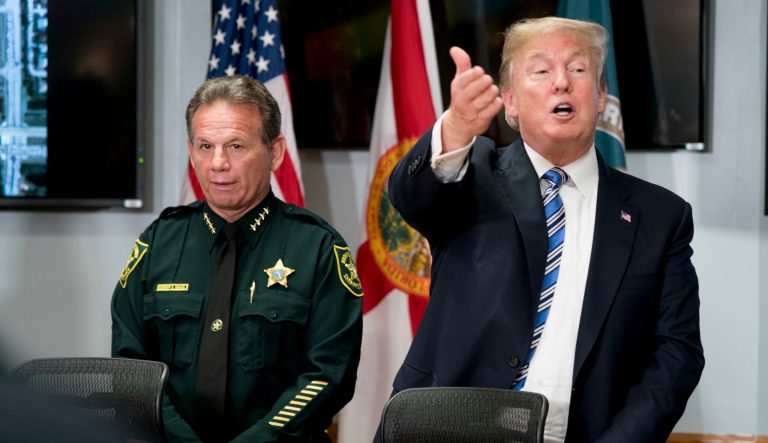 President Trump, accompanied by Broward County Sheriff Scott Israel, met with law enforcement officers at Broward County Sheriff's Office in Pompano Beach, Fla., on Friday following Wednesday's shooting at Marjory Stoneman Douglas High School in Parkland, Fla. (AP Photo/Andrew Harnik)