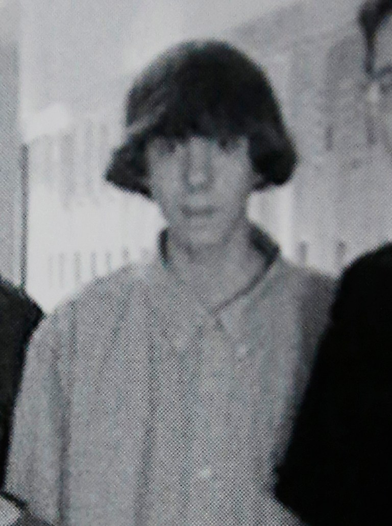   This undated photo shows Adam Lanza posing for a group photo of the technology club which appeared in the Newtown High School yearbook. Authorities have identified Lanza as the gunman who killed his mother at their home and then opened fire Friday, Dec. 14, 2012, inside an elementary school in Newtown, Conn., killing 26 people, including 20 children, before killing himself. Richard Novia, a one-time adviser to the technology club, verified that the photo shows Lanza. (AP Photo)  