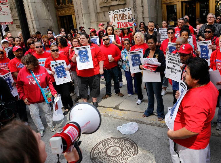 Ocol says other union members have been bullying him, telling him to go work for a public charter school. (AP Photo/Christian K. Lee)