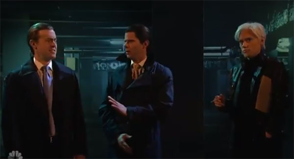 Kate McKinnon's depiction of Assange, including white hair, meets with Donald Trump Jr. (Mikey Day) and brother Eric Trump (Alex Moffatt) in a dark parking lot. (Screen shot)