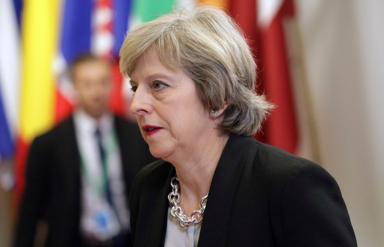 May said they backed policies that would make it impossible to negotiate peace with Palestinian leaders. (AP Photo/Olivier Matthys)