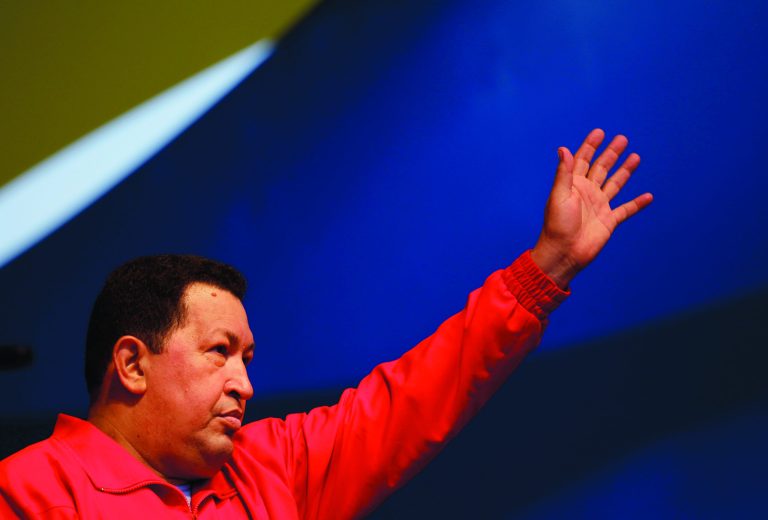 Venezuela's President Hugo Chavez waves to supporters during a campaign rally in the Antimano neighborhood of Caracas, Venezuela, Friday, Aug. 3, 2012. Venezuela's presidential election is scheduled for Oct. 7. (AP Photo/Ariana Cubillos)