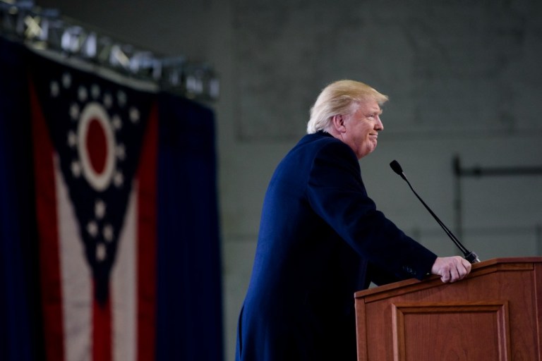Republican presidential candidate Donald Trump smiles while giving a speech during a campaign stop at the Signature Flight Hangar at Port-Columbus International Airport, Tuesday, March 1, 2016, in Columbus, Ohio. (AP Photo/John Minchillo)