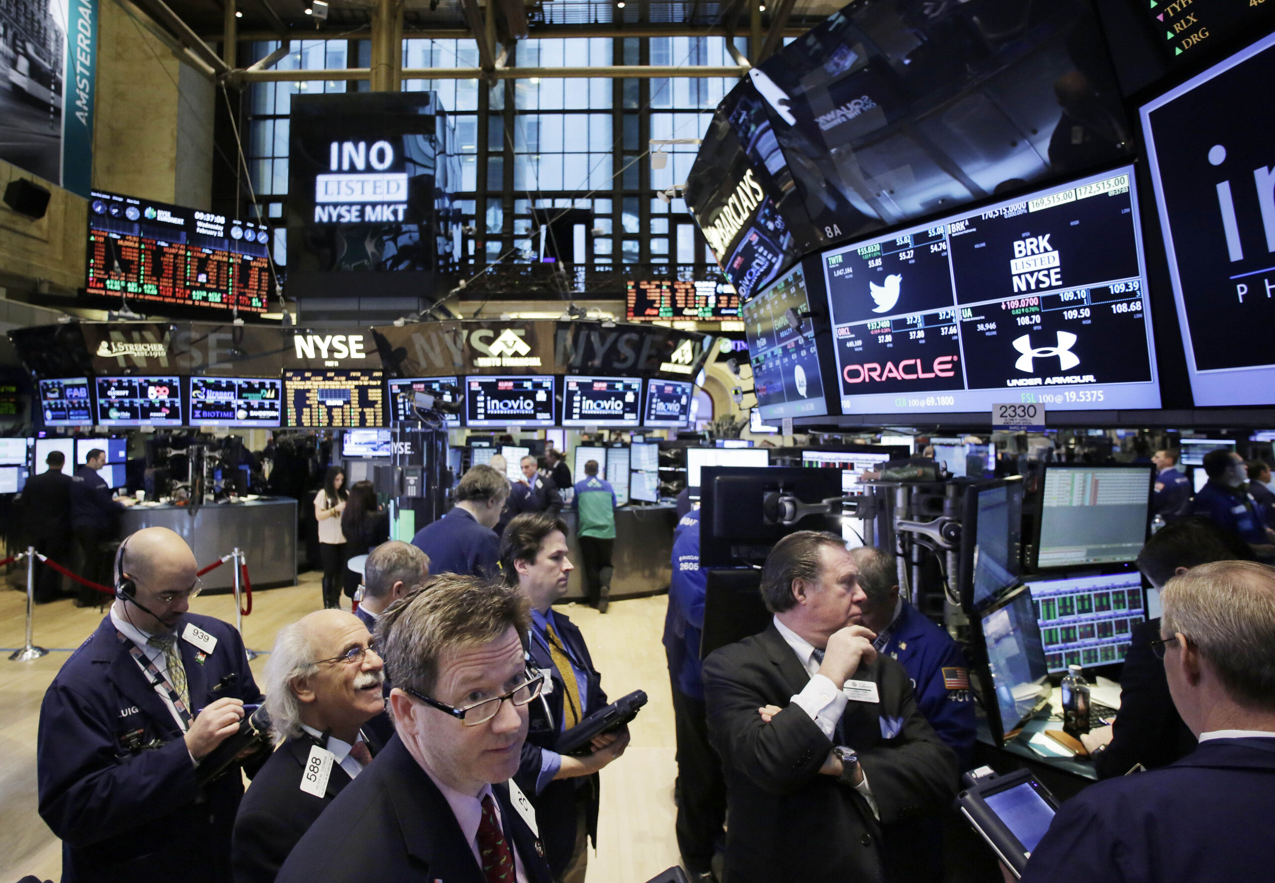 Stocks edge higher after holiday; Coca-Cola falls