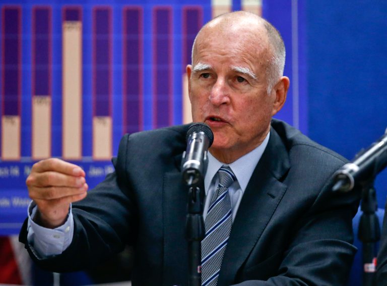 California Gov. Jerry Brown talks about the drought and water restrictions following a meeting with San Diego County officials to discuss continued conservation efforts Tuesday, Aug. 11, 2015, in San Diego. (AP Photo/Lenny Ignelzi)