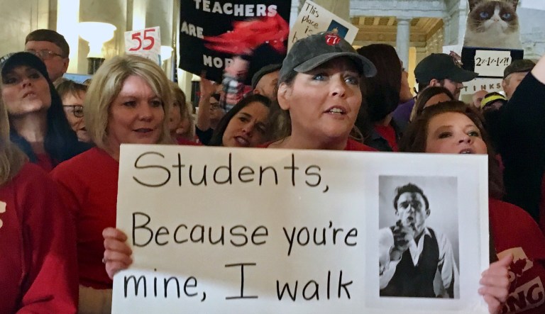 Teachers statewide in West Virginia went on strike Thursday over pay and benefits. (AP Photo/John Raby)