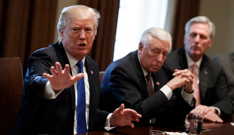 President Trump speaks met with a bipartisan group of legislators to discuss immigration policy reform on Tuesday. (AP Photo/Evan Vucci)