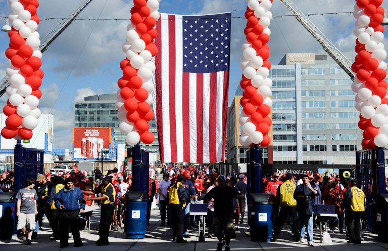 Fans enter Nationals Park before Game 3 of the National League division baseball series between the St. Louis Cardinals and the Washington Nationals on Wednesday, Oct. 10, 2012, in Washington. (AP Photo/Nick Wass)