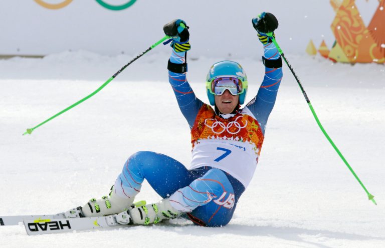 United States' Ted Ligety celebrates after winning the gold medal in the men's giant slalom at the Sochi 2014 Winter Olympics, Wednesday, Feb. 19, 2014, in Krasnaya Polyana, Russia.(AP Photo/Gero Breloer)