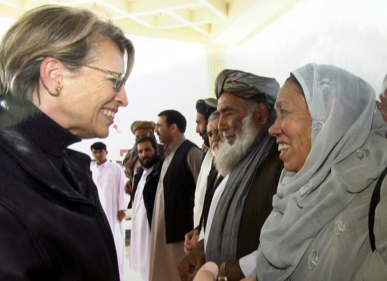 Safia Ama Jan, right, an Afghani women's rights advocate, was killed in 2006. In this undated photo, she greets visiting French Defense Minister Michele Alliot-Marie in Kandahar. (AP Photo/Ama Jan family, HO)