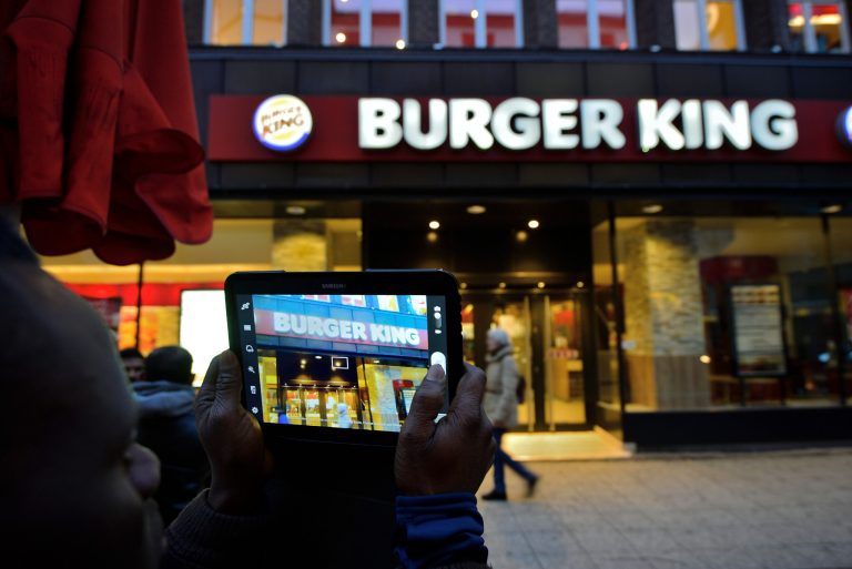 Burger King is following in the stead of McDonald's and Wendy's by removing soft drinks from its kids menu boards and instead offering fat-free milk. (Getty Images)