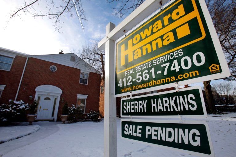 In this Thursday, Jan. 9, 2014, photo, a for sale sign is placed in front of a house in Mount Lebanon, Pa. Standard & Poor's releases S&P/Case-Shiller index of home prices for November, on Tuesday, Jan. 28, 2014. (AP Photo/Gene J. Puskar)