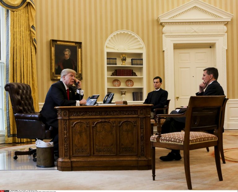 President Donald Trump speaks with the King of Saudi Arabia, Salman bin Abd al-Aziz Al Saud in the Oval Office of the White House surrounded by Senior Adviser to the President Jared Kushner (C), and Security Adviser Michael Flynn (R), January 29, 2017