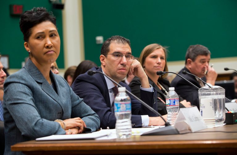 From left, Cheryl Campbell, senior vice president of CGI Federal; Andrew Slavitt, group executive vice president for Optum/QSSI; Lynn Spellecy, corporate counsel for Equifax Workforce Solutions; and John Lau, program director for Serco, listen to questioning on Capitol Hill on, Thursday during aÃÂ HouseÃÂ EnergyÃÂ andÃÂ CommerceÃÂ CommitteeÃÂ hearing. (AP/ Evan Vucci)