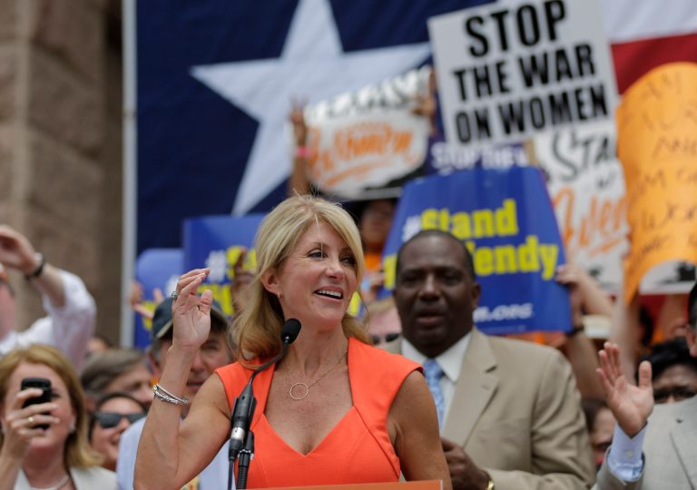 Sen. Wendy Davis, D- Fort Worth, speaks during a rally against abortion legislation, Monday, July 1, in Austin, Texas. A new Public Policy Polling survey released Tuesday shows Davisâ name recognition and favorables are through the roof in the days since her filibuster garnered national attention. (AP Photo/Eric Gay)
