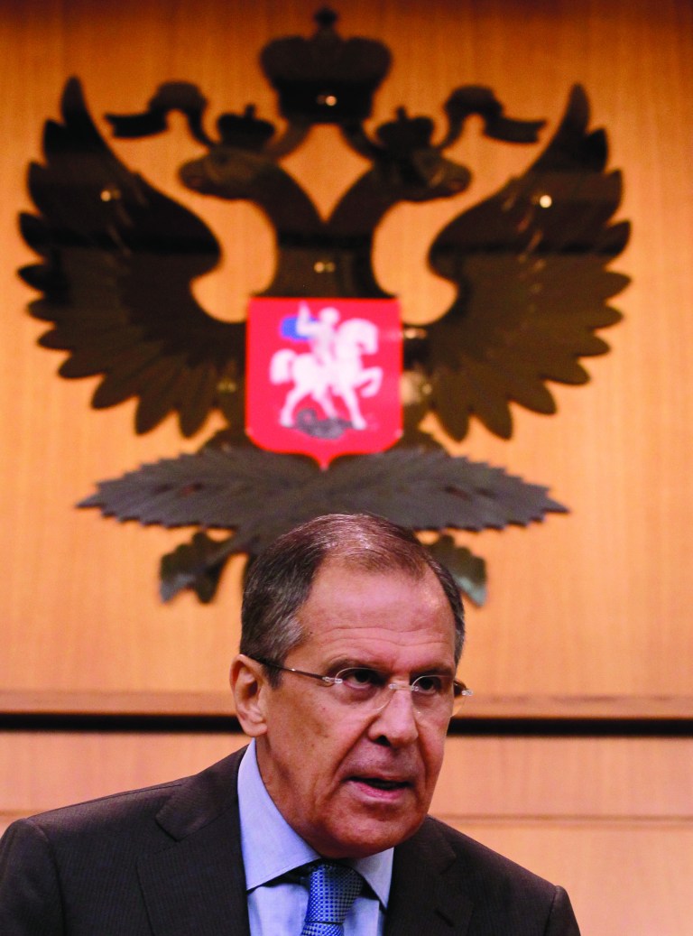 Russian Foreign Minister Sergey Lavrov speaks at a news conference in Moscow, Monday, July 16, 2012. Lavrov said Monday the Western threats to discontinue the 300-strong U.N. unarmed observer mission to Syria if Russia does not agree to allow the West to use force in the country amounts to blackmail. (AP Photo/Sergey Ponomarev)