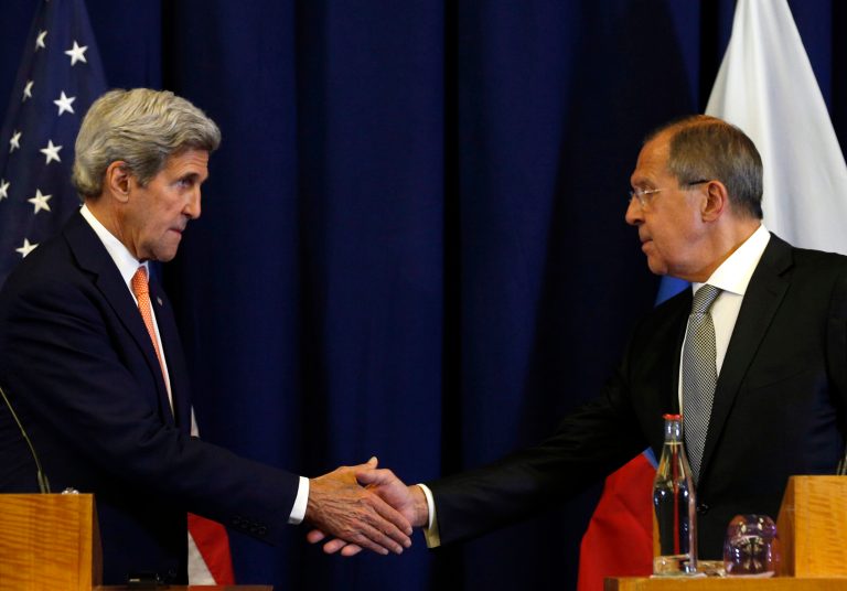 Secretary of State John Kerry, left, and Russian Foreign Minister Sergei Lavrov shakes hands after their meeting to discuss the crisis in Syria. (Kevin Lamarque/Pool Photo via AP, File)