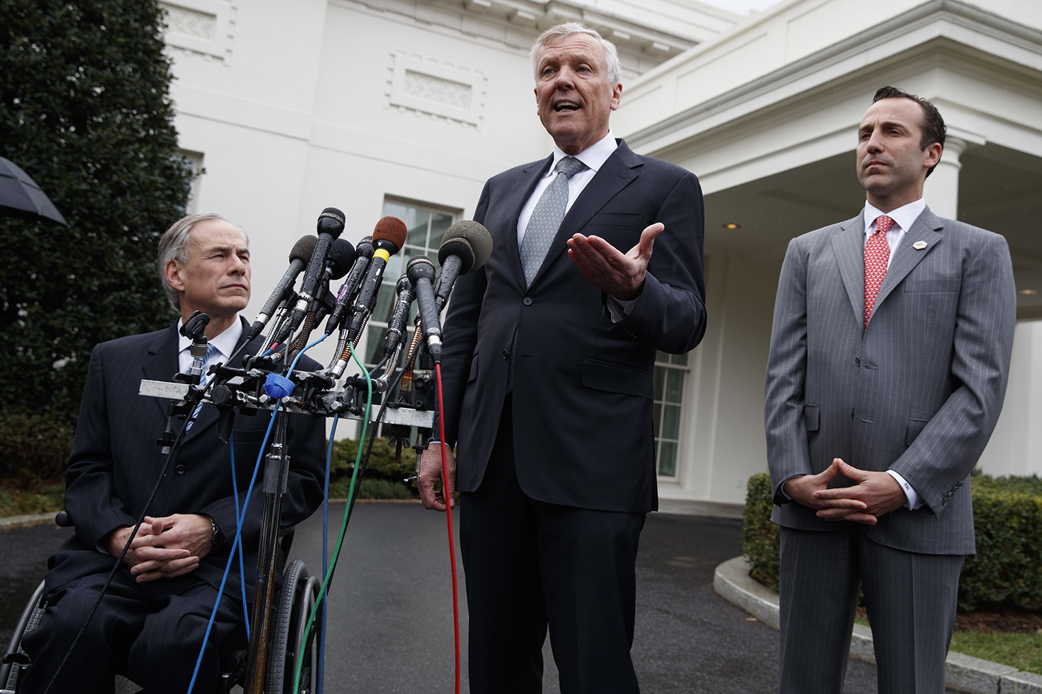 Trump, Texas Gov. Abbott promote Charter Communications deal