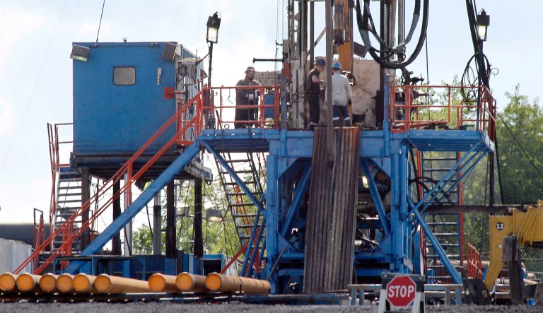In this 2012 file photo, a crew works on a gas drilling rig at a well site for shale-based natural gas in Zelienople, Pa. The Industrial Energy Consumers of America sent a letter to Energy Secretary Rick Perry, Commerce Secretary Wilbur Ross, and U.S. Trade Representative Robert Lighthizer on Thursday asking the Trump administration to stop approvals of any new natural gas export licenses. (AP Photo/Keith Srakocic, File)