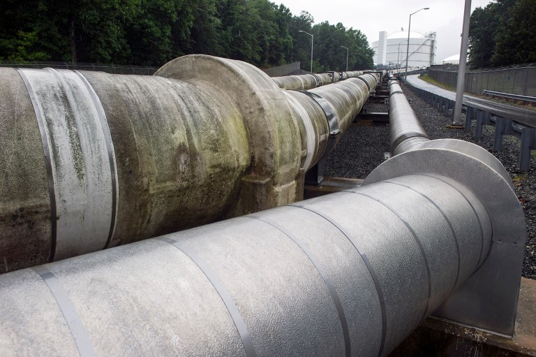 Transfer pipes carrying liquified natural gas to and from a holding tank. The U.S. is set to be a net exporter of natural gas by next year, the federal government reported Friday. (AP Photo/Cliff Owen)