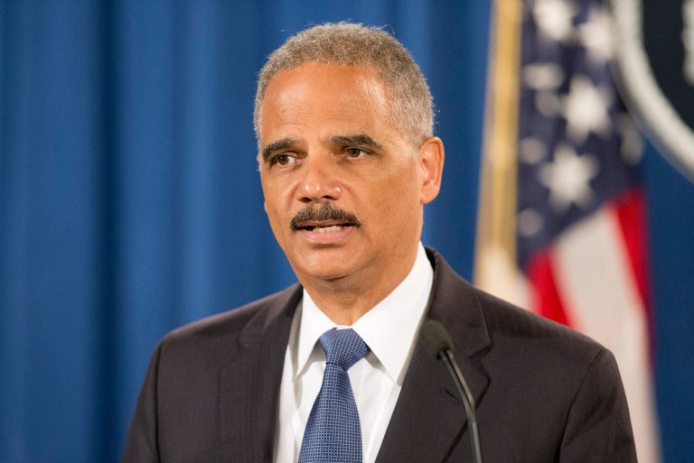 Attorney General Eric Holder speaks during a news conference at the Justice Department in Washington, Sept. 4, to announce the Justice Department's civil rights division will launch a broad civil rights investigation in the Ferguson, Mo., Police Department. (AP Photo/Pablo Martinez Monsivais)