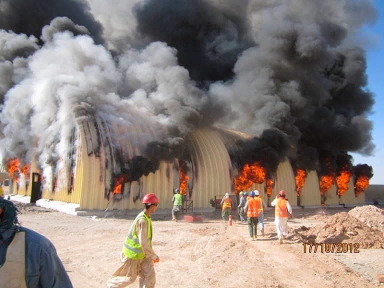 Fire consumes an arch-span building at Afghan National Army Brigade Camp Sayar in Afghanistan in 2012. The incident report on the fire said the building, which was 85 percent complete, burned in 30 minutes. (Photo: U.S. Army Corps of Engineers via SIGAR)